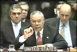 Colin Powell (foreground), lying to the United Nations about Iraq, February 5, 2003. White House photo.